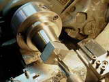Reaming the rear ball bearing housing; the collet must be concentric for this operation