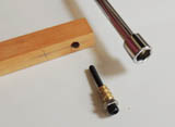 Lubricate insert thread and screw home with a nut-driver